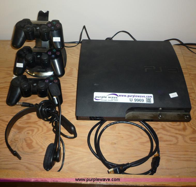 Sony PS3 game console with three controllers in Manhattan, KS Item