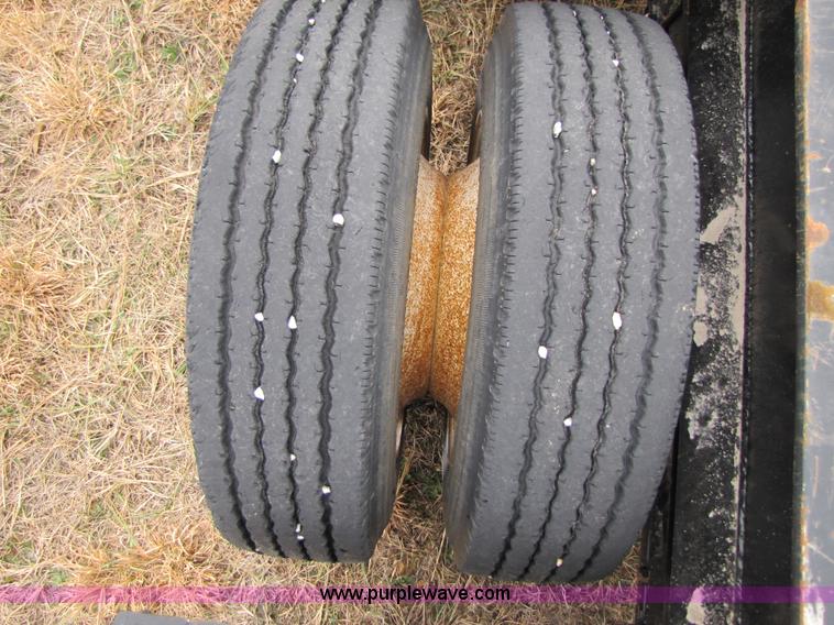 image for item B2182 1999 Fontaine 50 ton detach lowboy trailer