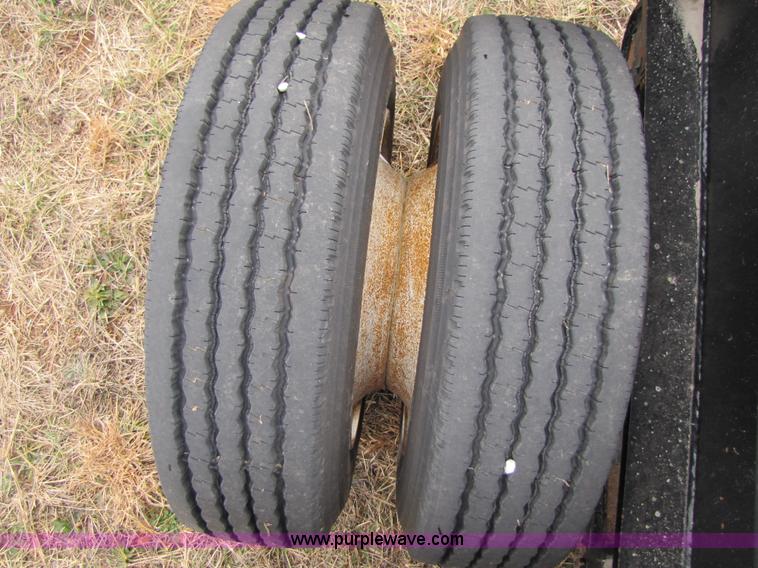 image for item B2182 1999 Fontaine 50 ton detach lowboy trailer