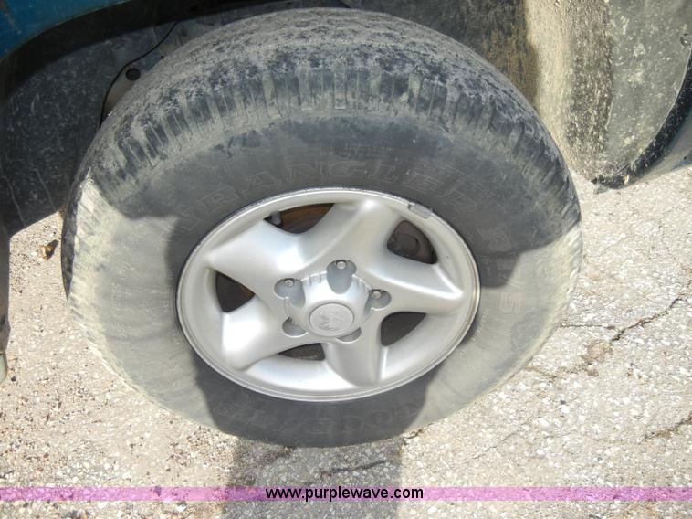 image for item C4061 1998 Dodge Ram 1500 quad cab pickup truck