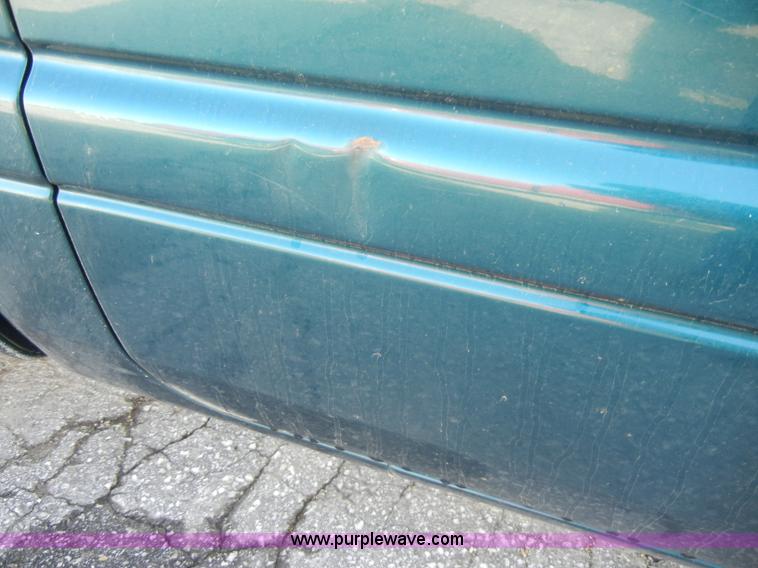 image for item C4061 1998 Dodge Ram 1500 quad cab pickup truck