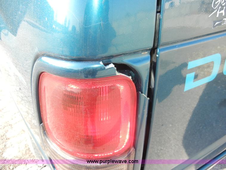 image for item C4061 1998 Dodge Ram 1500 quad cab pickup truck