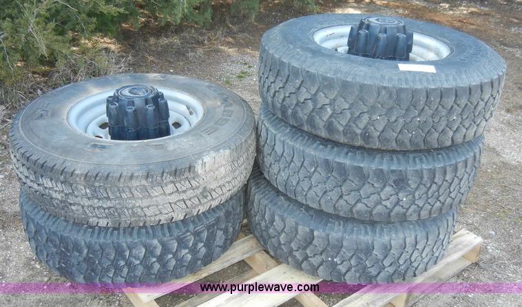 image for item C4179 (5) used 16" tires with rims and caps