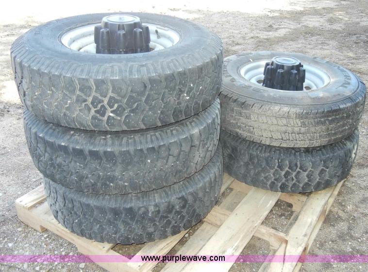 image for item C4179 (5) used 16" tires with rims and caps