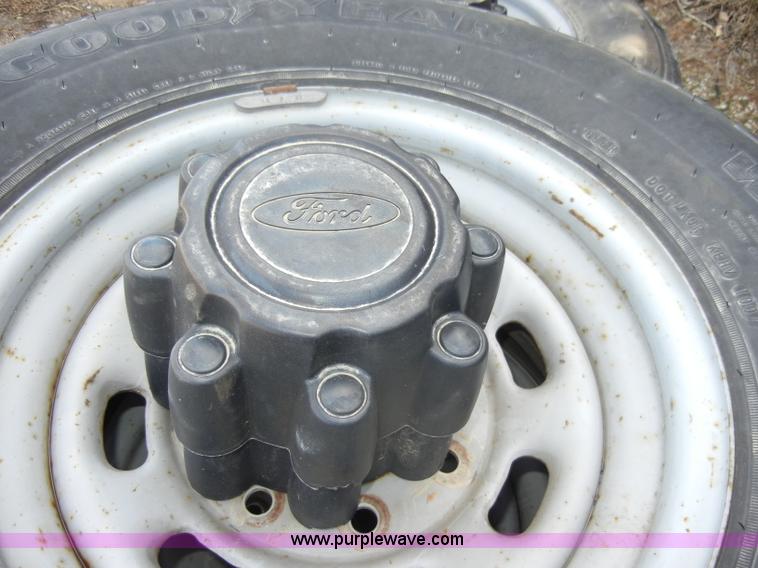 image for item C4179 (5) used 16" tires with rims and caps