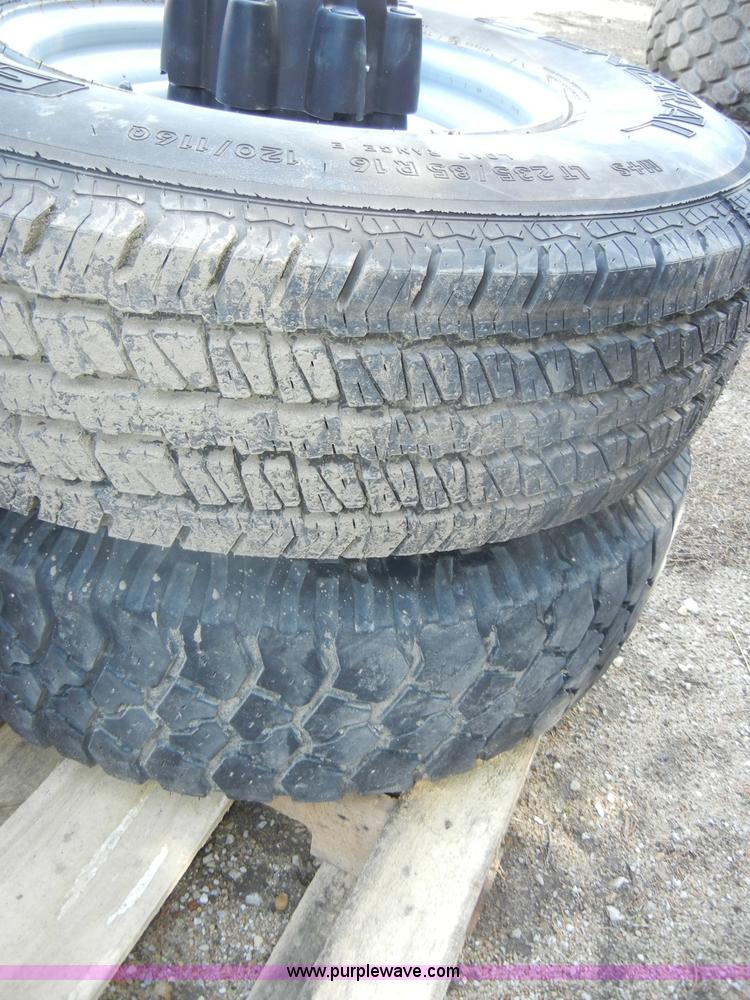 image for item C4179 (5) used 16" tires with rims and caps