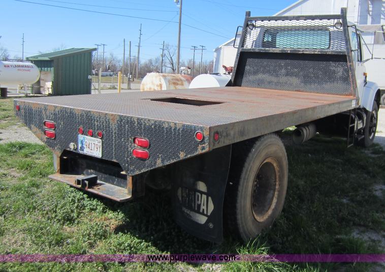 image for item C5339 1991 International 4700 flatbed truck