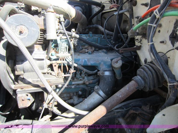 image for item C5339 1991 International 4700 flatbed truck