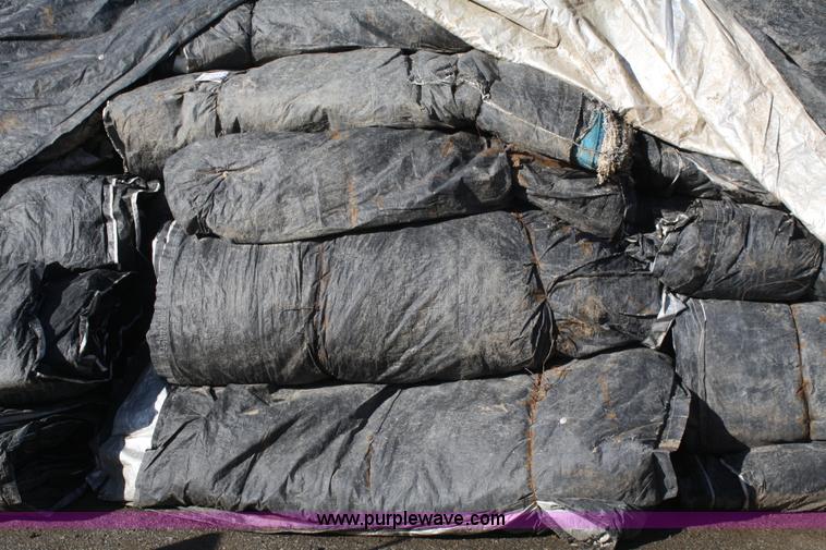 image for item A6943 Approximately 90 12' x 25' concrete double tarps