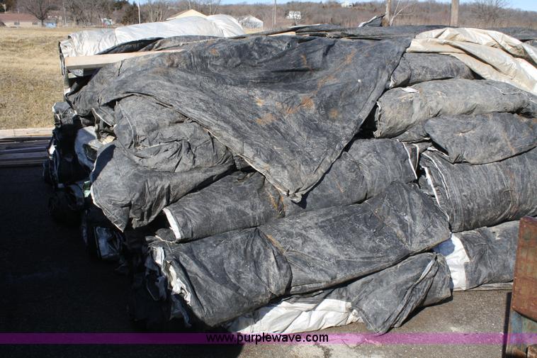 image for item A6943 Approximately 90 12' x 25' concrete double tarps