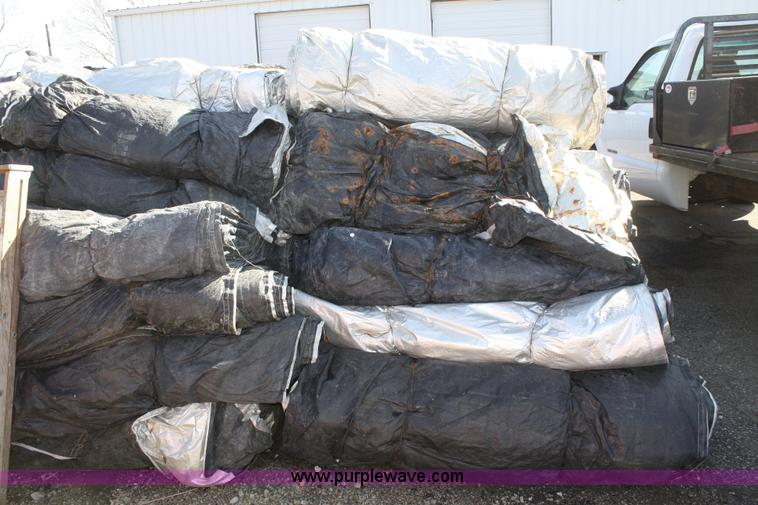 image for item A6943 Approximately 90 12' x 25' concrete double tarps