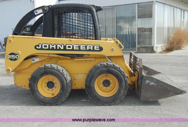 image for item C4103 1999 John Deere 250 skid steer