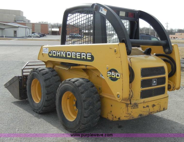 image for item C4103 1999 John Deere 250 skid steer