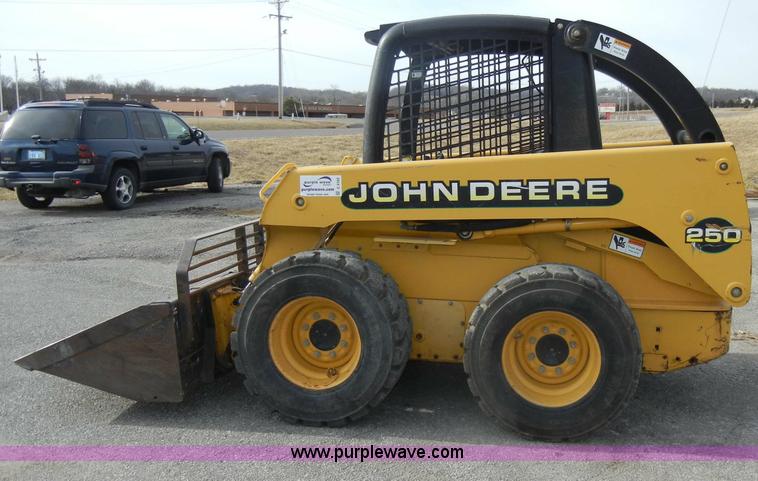 image for item C4103 1999 John Deere 250 skid steer