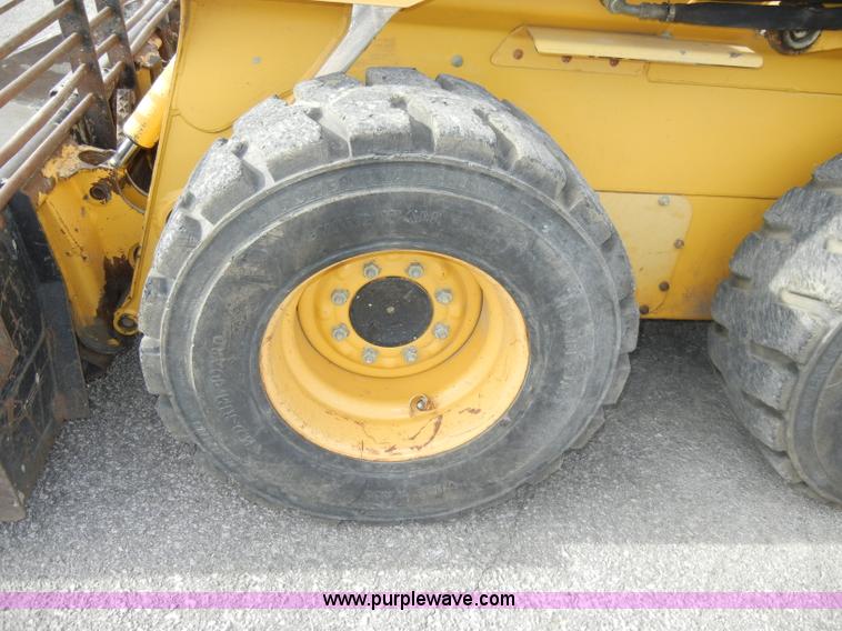 image for item C4103 1999 John Deere 250 skid steer