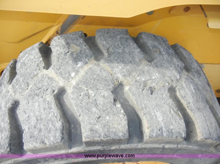 image for item C4103 1999 John Deere 250 skid steer