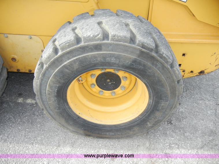 image for item C4103 1999 John Deere 250 skid steer