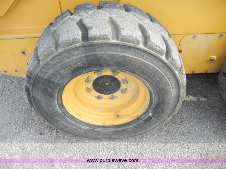 image for item C4103 1999 John Deere 250 skid steer