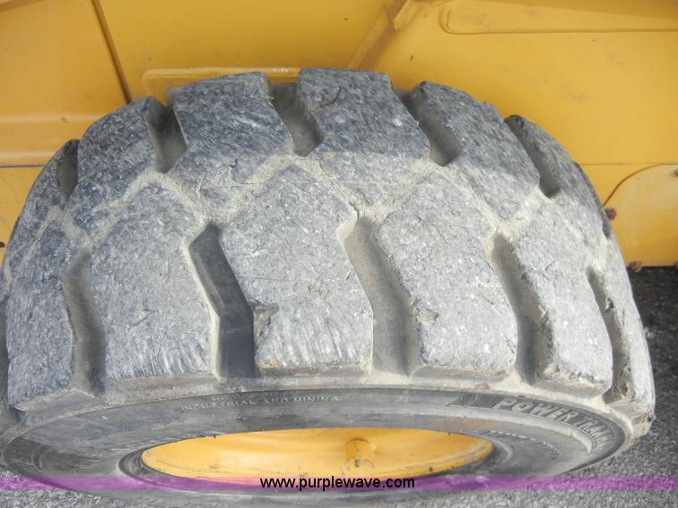 image for item C4103 1999 John Deere 250 skid steer