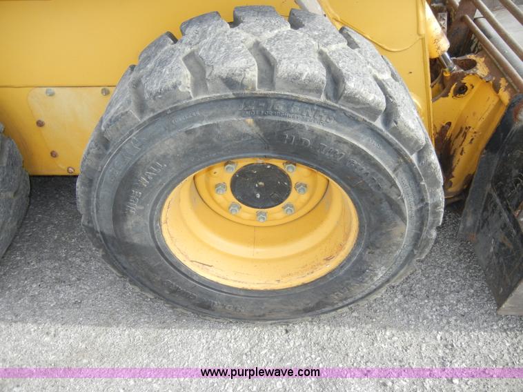 image for item C4103 1999 John Deere 250 skid steer