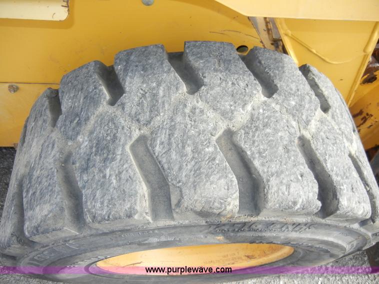 image for item C4103 1999 John Deere 250 skid steer