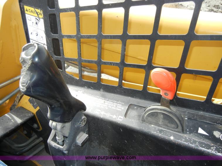 image for item C4103 1999 John Deere 250 skid steer