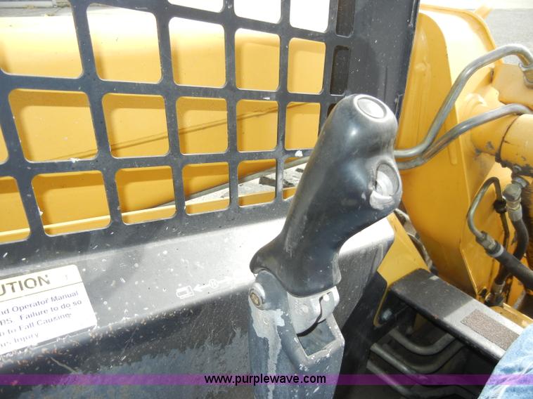 image for item C4103 1999 John Deere 250 skid steer