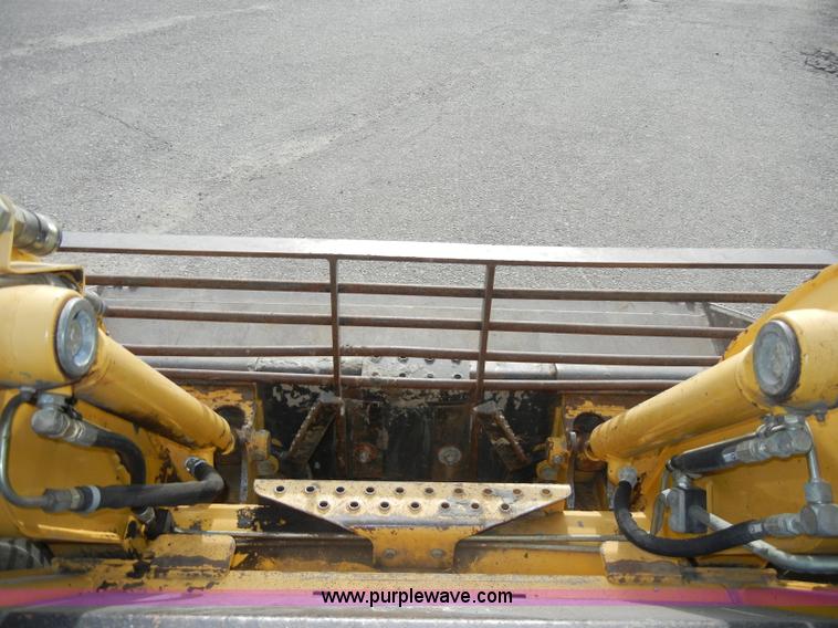 image for item C4103 1999 John Deere 250 skid steer