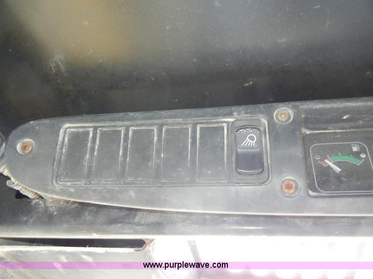 image for item C4103 1999 John Deere 250 skid steer