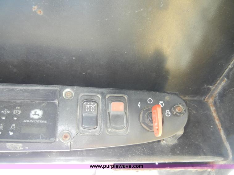 image for item C4103 1999 John Deere 250 skid steer