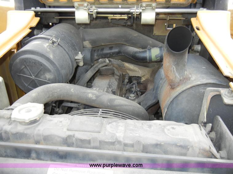 image for item C4103 1999 John Deere 250 skid steer