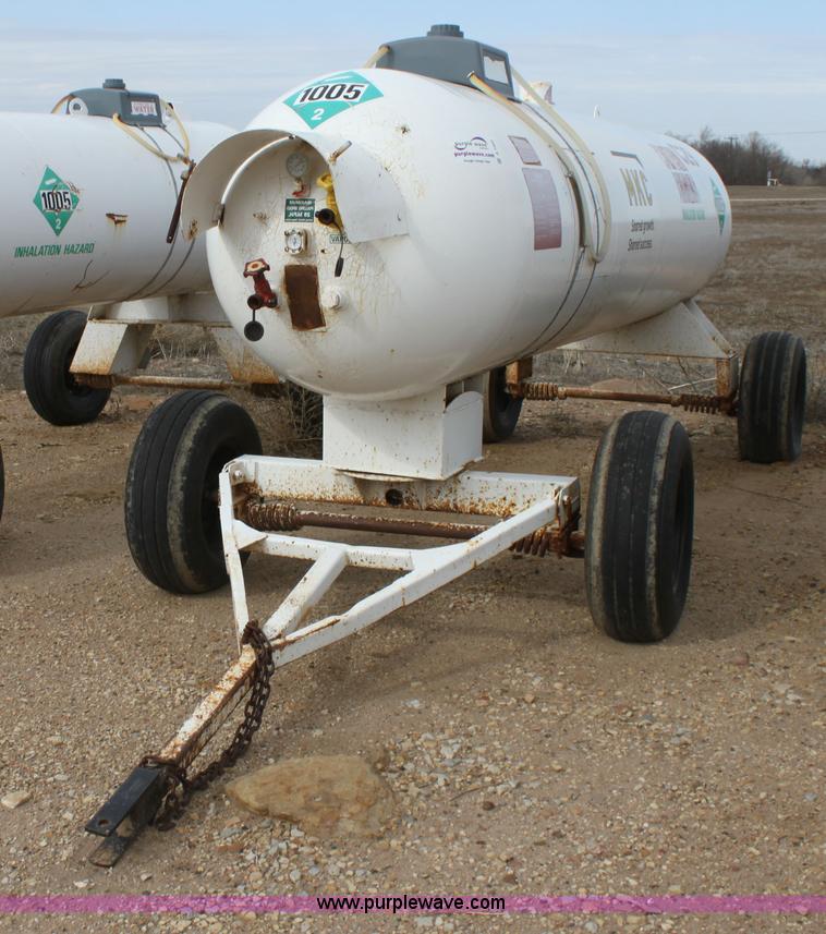 image for item A7368 1000 gallon anhydrous ammonia tank with running gear