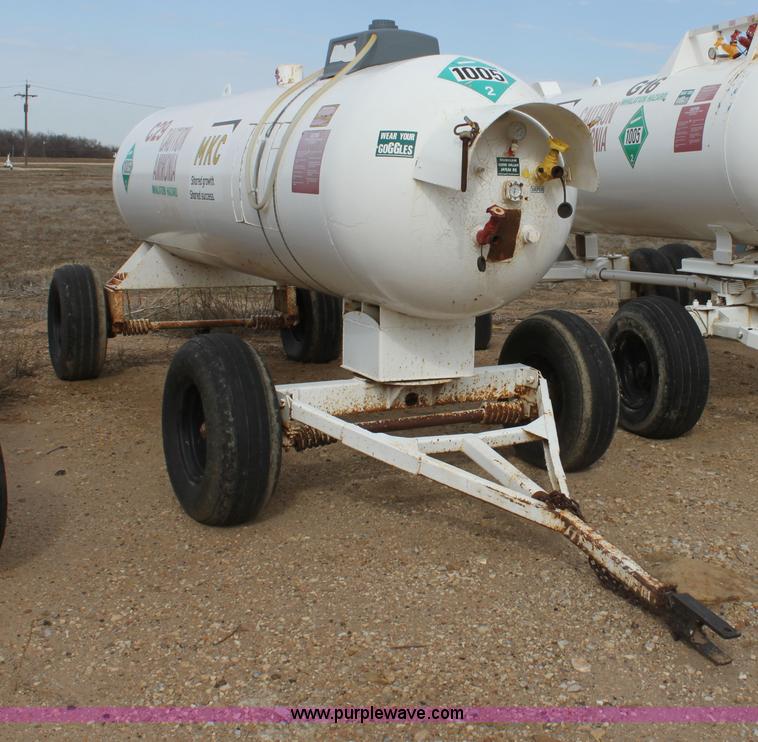 image for item A7368 1000 gallon anhydrous ammonia tank with running gear