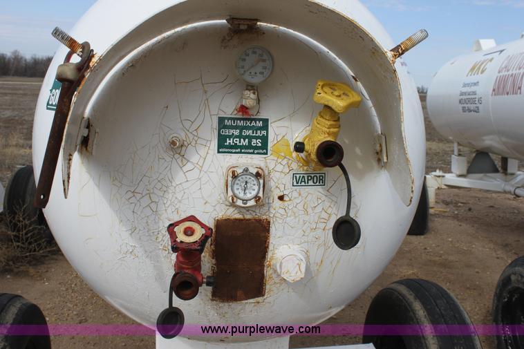 image for item A7368 1000 gallon anhydrous ammonia tank with running gear