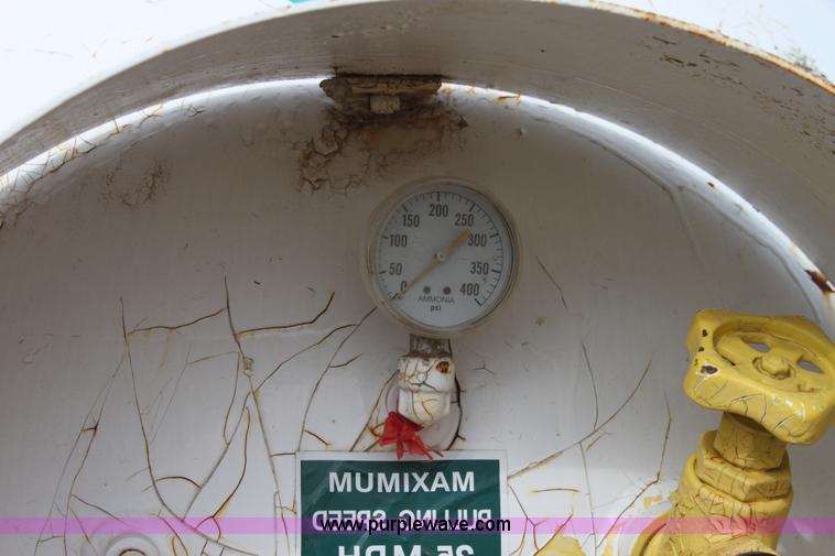 image for item A7368 1000 gallon anhydrous ammonia tank with running gear