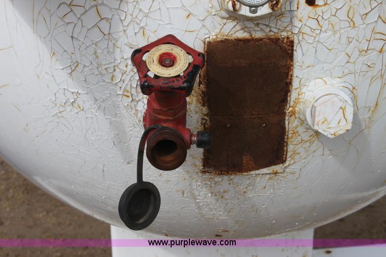 image for item A7368 1000 gallon anhydrous ammonia tank with running gear