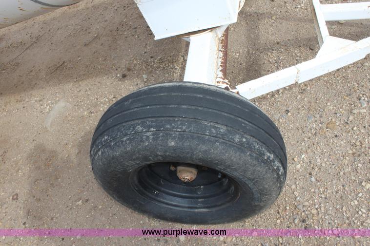 image for item A7368 1000 gallon anhydrous ammonia tank with running gear