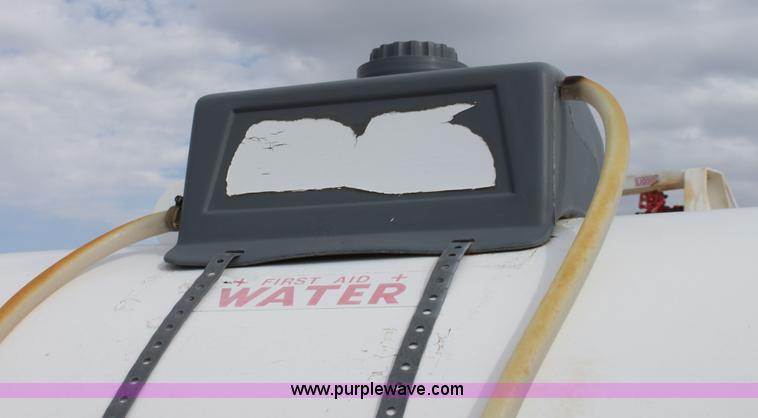 image for item A7368 1000 gallon anhydrous ammonia tank with running gear