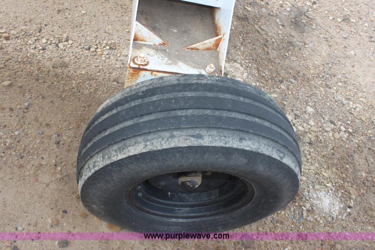 image for item A7368 1000 gallon anhydrous ammonia tank with running gear