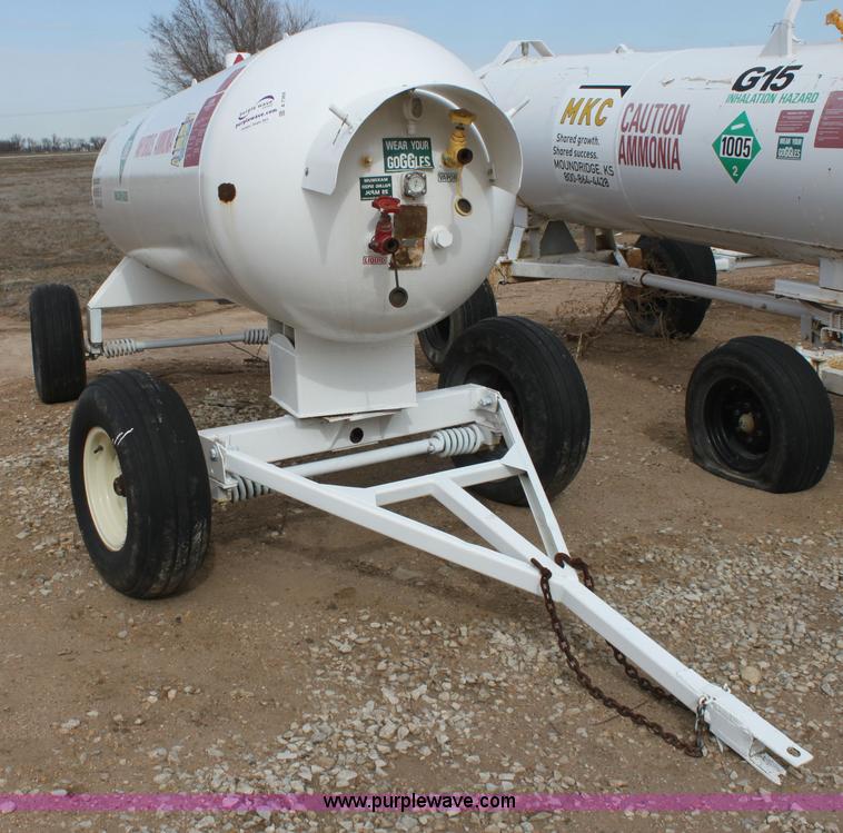 image for item A7369 1000 gallon anhydrous ammonia tank with running gear