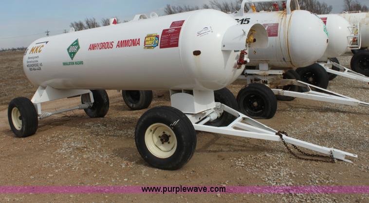 image for item A7369 1000 gallon anhydrous ammonia tank with running gear