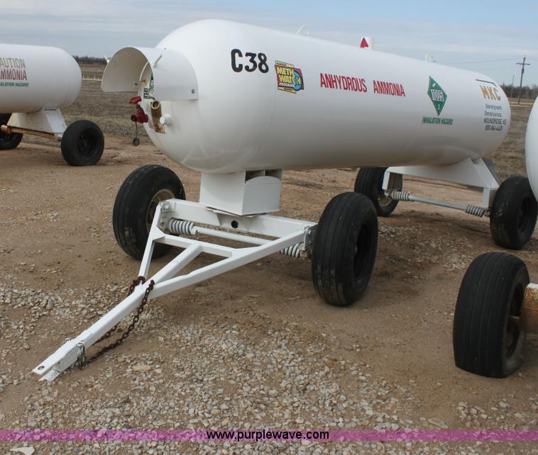 image for item A7369 1000 gallon anhydrous ammonia tank with running gear