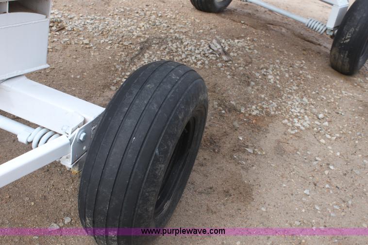 image for item A7369 1000 gallon anhydrous ammonia tank with running gear
