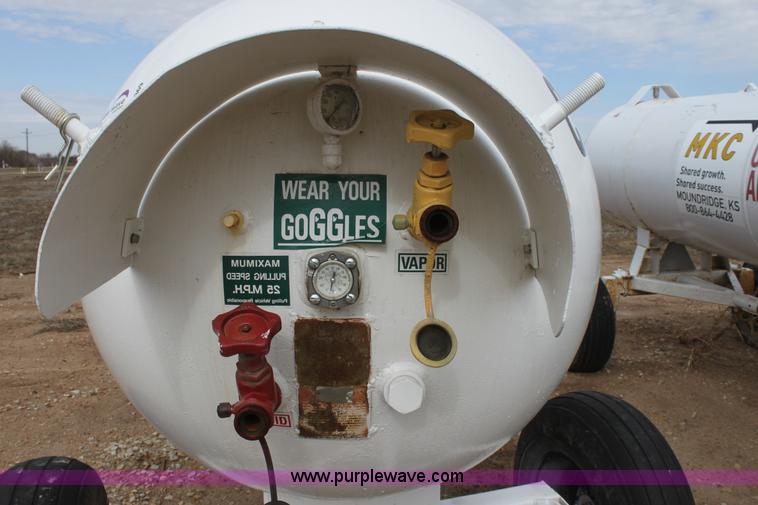 image for item A7369 1000 gallon anhydrous ammonia tank with running gear