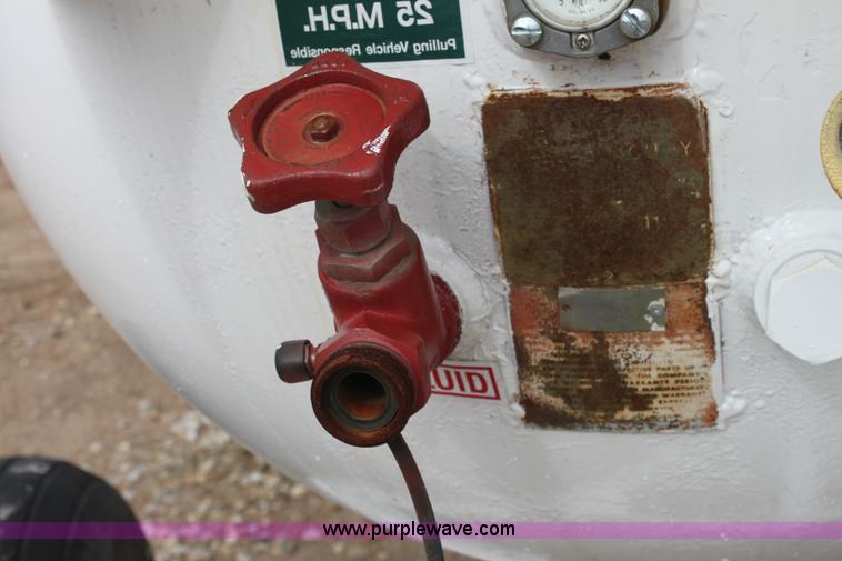 image for item A7369 1000 gallon anhydrous ammonia tank with running gear