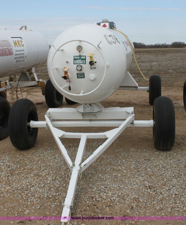 image for item A7370 1000 gallon anhydrous ammonia tank with running gear