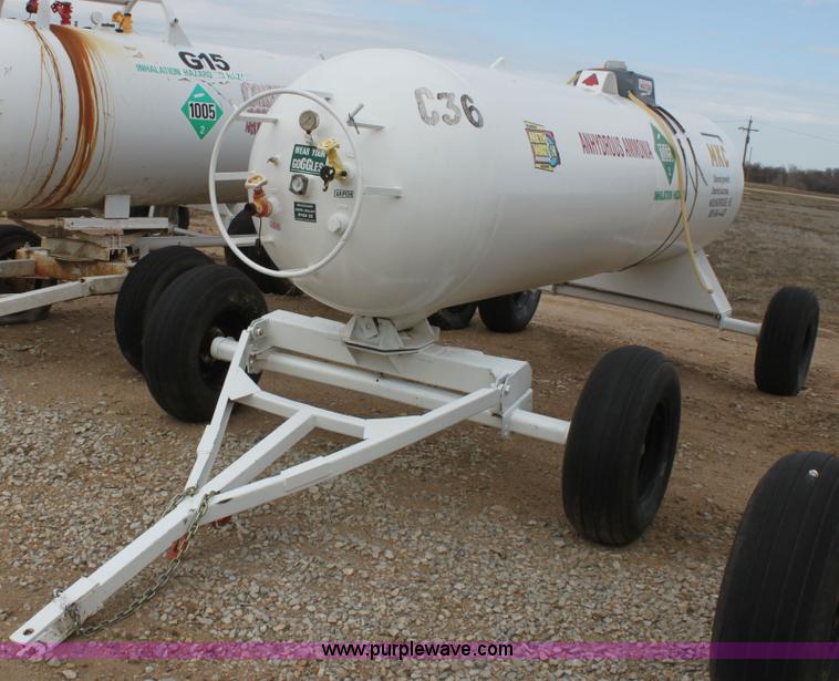 image for item A7370 1000 gallon anhydrous ammonia tank with running gear