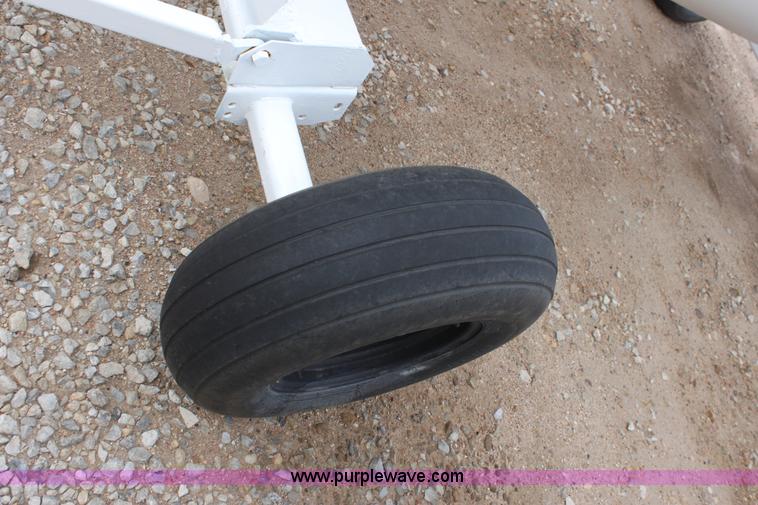 image for item A7370 1000 gallon anhydrous ammonia tank with running gear