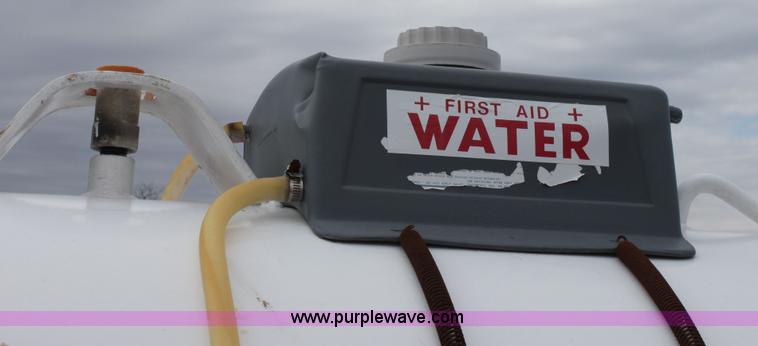 image for item A7370 1000 gallon anhydrous ammonia tank with running gear