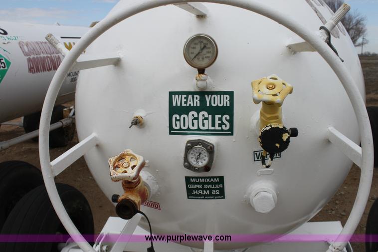 image for item A7370 1000 gallon anhydrous ammonia tank with running gear